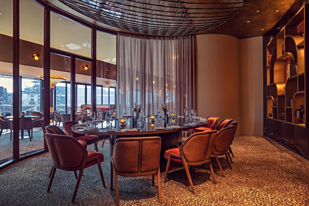 Hyatt Regency Dusseldorf Düsseldorf Exterior foto The restaurant's interior